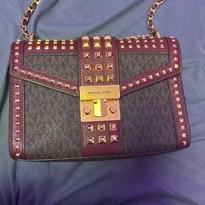 MK burgundy stud bag